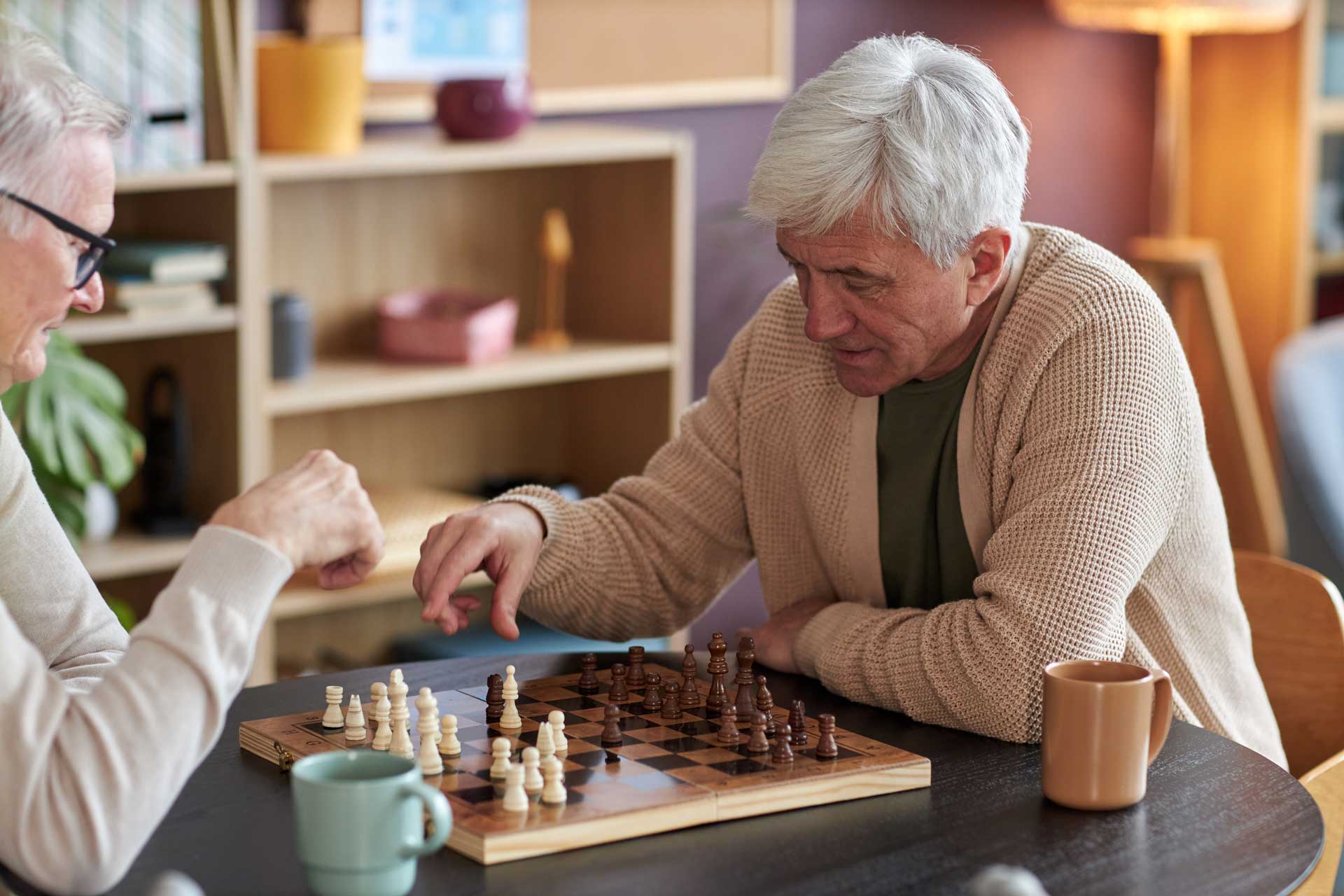 Community_578983495_web two men playing a game of chess